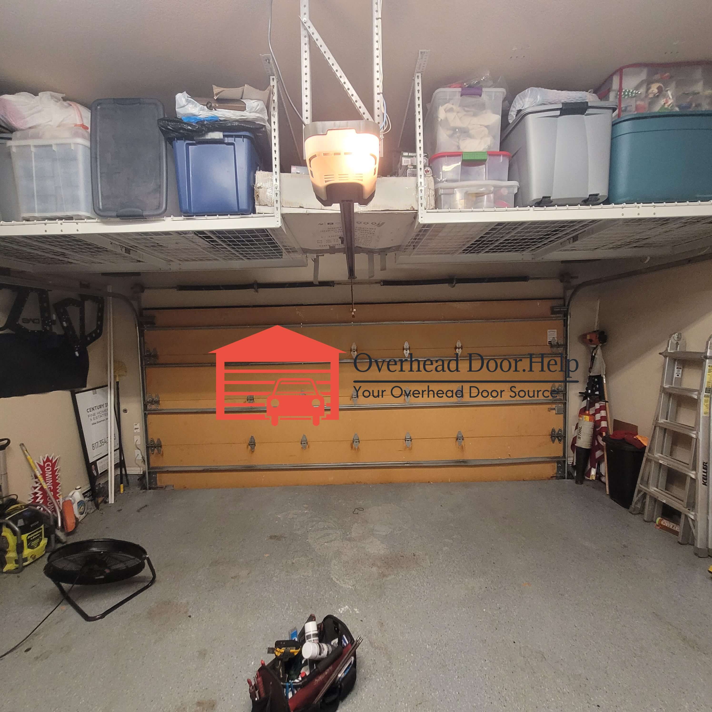 overheaddoor.help_wood_garage_door_spring_replacement